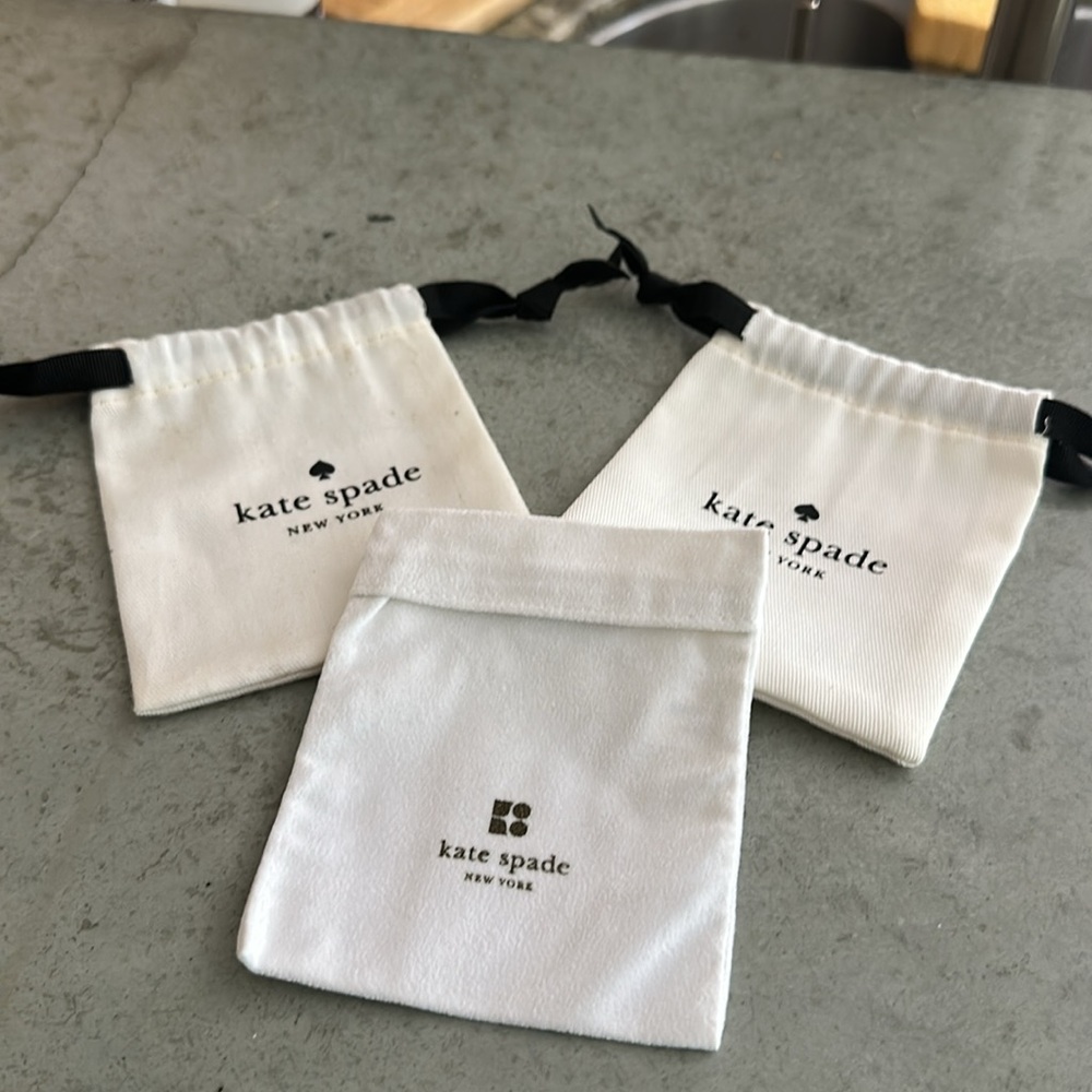 Kate Spade White Drawstring Pouches